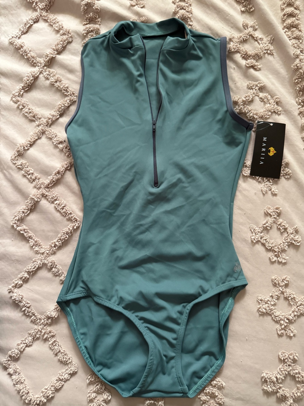 Mariia‎ M2 sleeveless leotard features a high neck and a functional front zipper